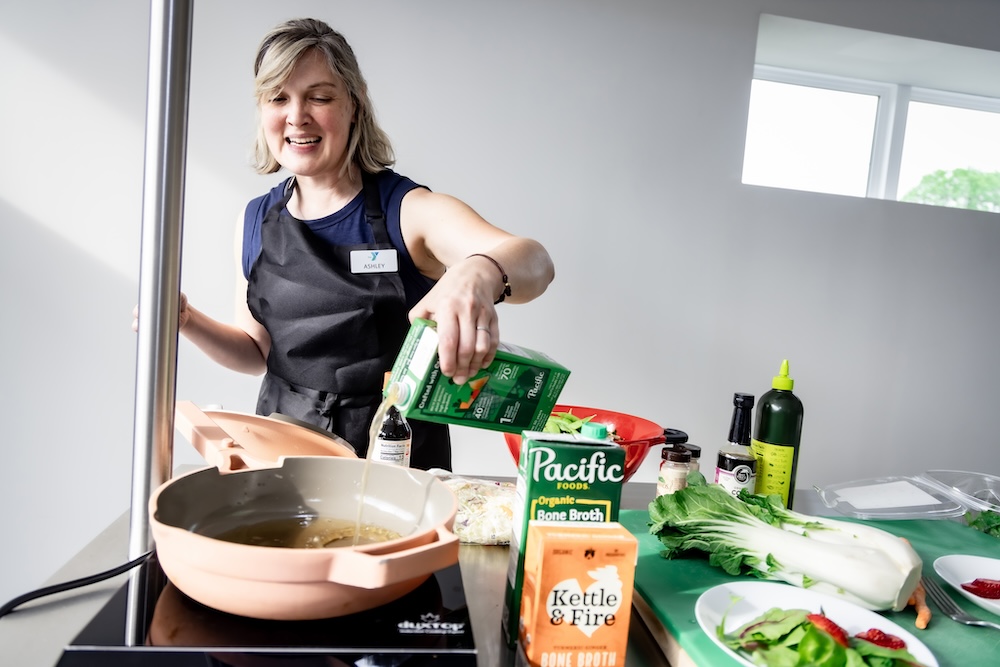 Ashley teaching JA Henry Cooking Classes