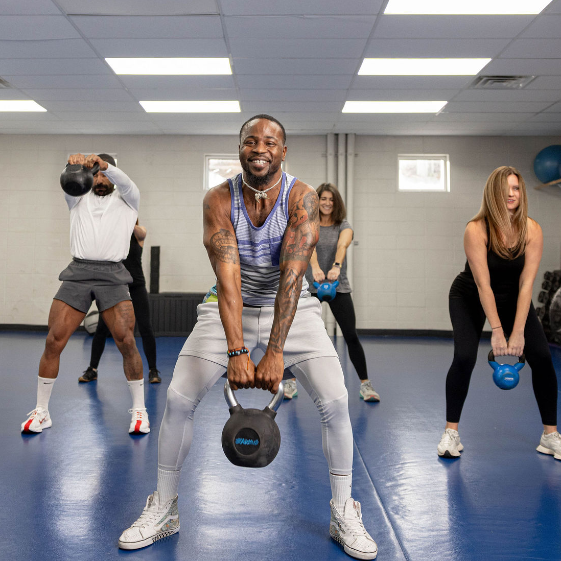 Group exercise class with kettlebells