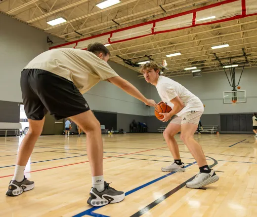 basketball playing in a gym